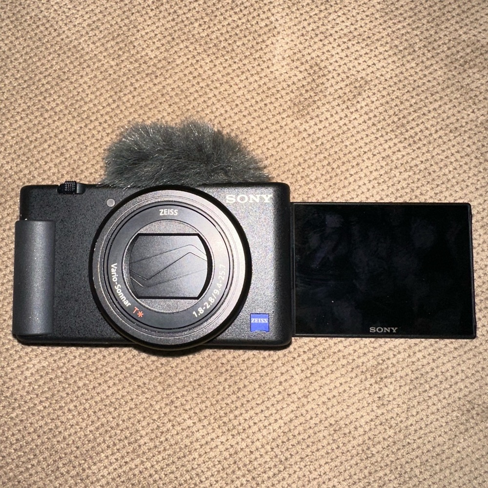 Sony Black Digital Camera with Flip Screen and Zeiss Lens